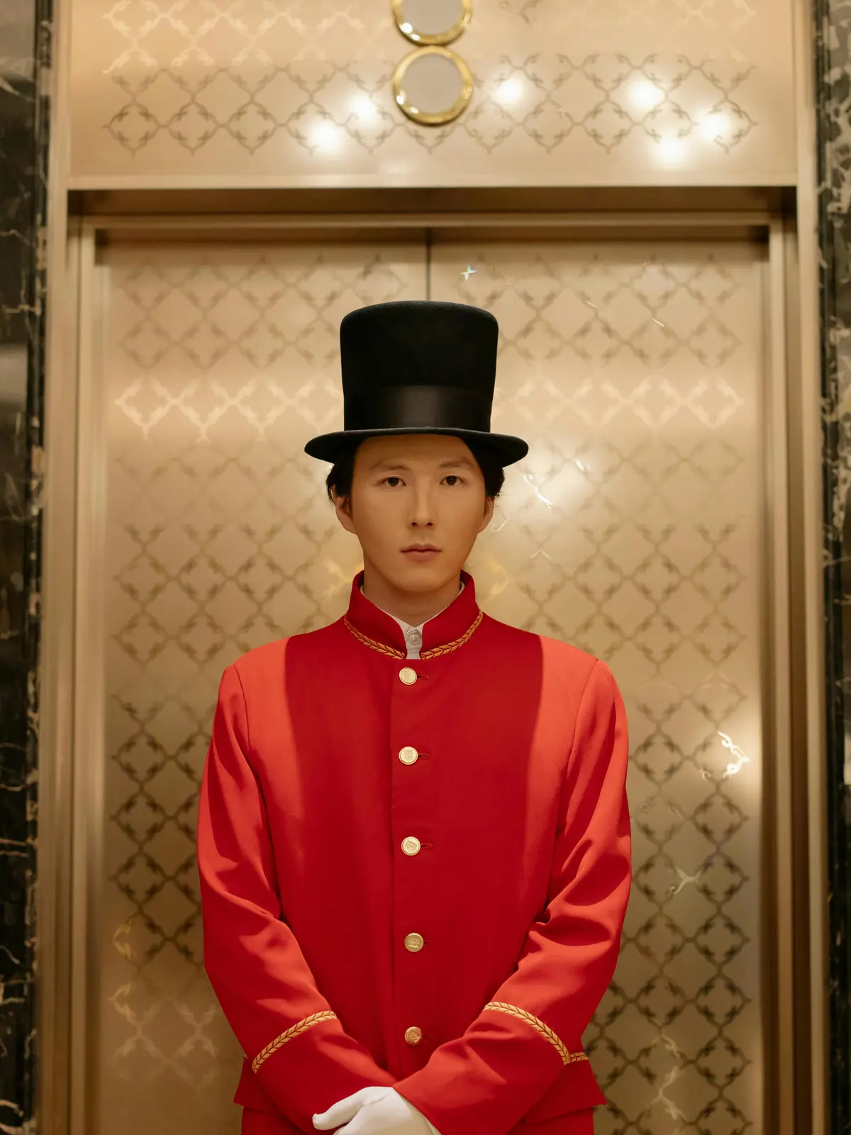 Hospitality manager hosting guests in a stylish lounge