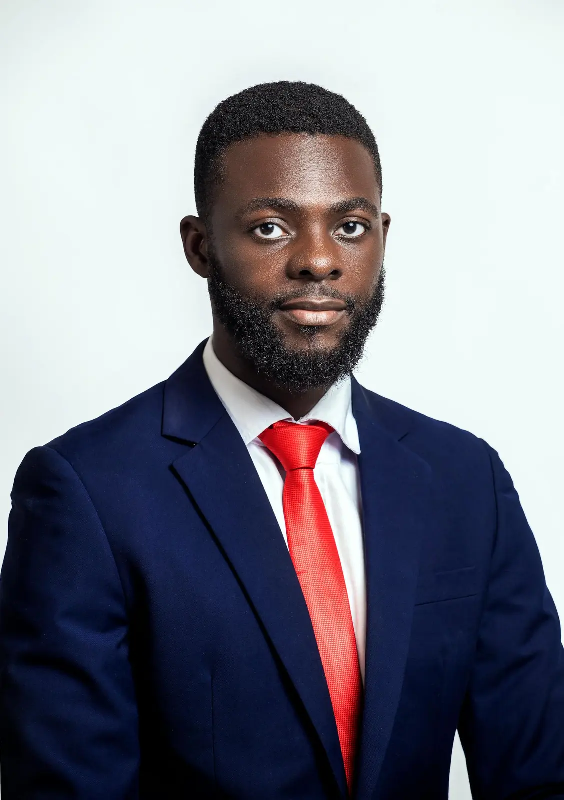 Founder delivering a confident pitch while smiling at investors